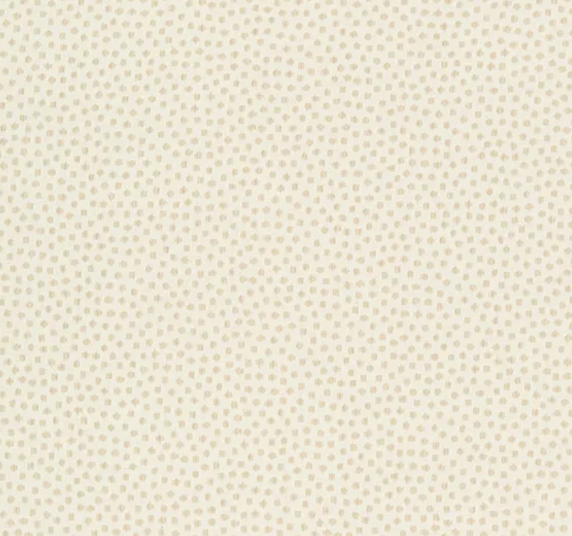 Light tan fabric with a subtle irregular spotted pattern in slightly darker beige dots, evenly distributed across the background.