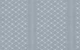 Wallpaper with repeating vertical stripes of small white floral patterns in star clusters on a soft, muted blue background.