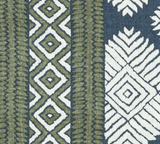 Fabric pattern with vertical stripes featuring diamond motifs and zigzag lines in bluestone blue, green, and white colors.