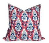 Red Cornwall floral pillow cover with ivory linen backing on sofa
