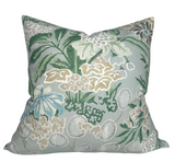 Square pillow cover with a sage green background featuring a detailed floral pattern in muted greens, blues, beige, and white tones.