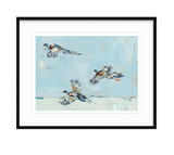 Fine art print featuring three pheasants in mid-flight against a soft blue and beige abstract background with expressive brushstrokes and detailed wing patterns.