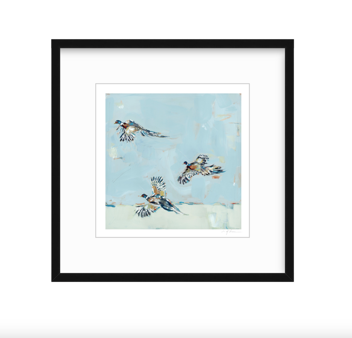 Fine art print of three pheasants in mid-flight against a soft blue sky with subtle cream tones, framed in a simple black frame with white matting.