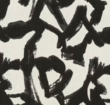 Close-up of a pillow cover with bold black abstract brushstroke patterns on a white background, featuring thick, uneven lines and shapes.