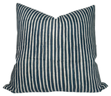 Ticking Pillow Cover in Indian Teal with ivory linen back, shown on a sofa setting