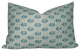 Rajmata pillow cover in blue and ivory linen on a neutral surface