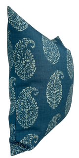 Blue pillow cover with white Kashmir paisley floral pattern, shown at an angled side view highlighting its texture and print.