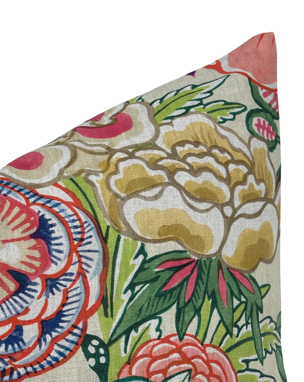 Corner of beige pillow cover with large peony floral pattern in shades of gold, green, coral, and blue, featuring detailed leaves and petal shapes.