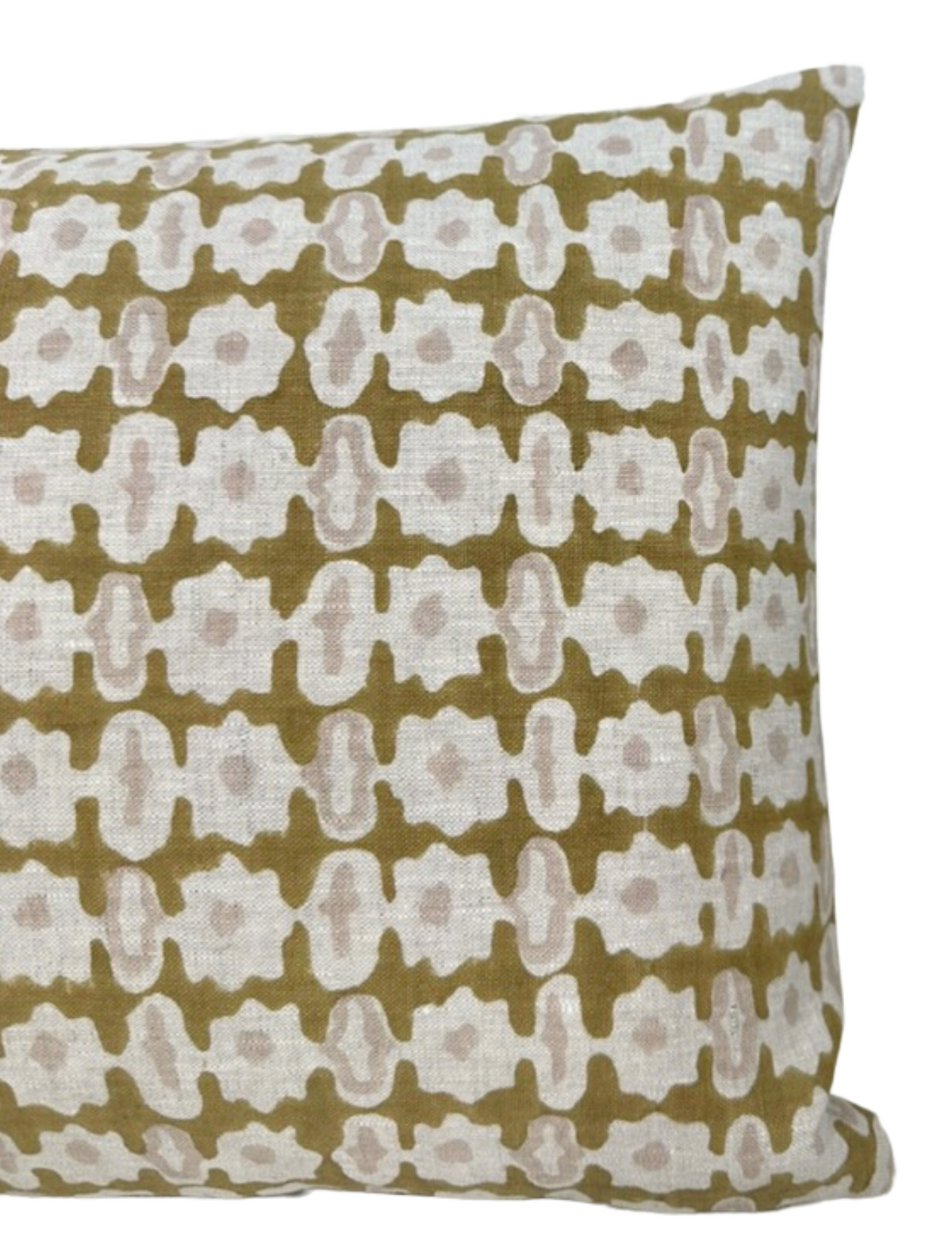 Close-up of a square pillow cover with a repeating geometric floral pattern in off-white and muted saffron on a textured fabric background.