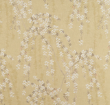 Fabric with a soft gold background featuring delicate white cherry blossom branches with subtle brown detailing in a cascading pattern.
