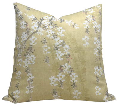 Weeping Blossom Pillow Cover in Gold displayed with floral printed fabric on front and ivory linen back