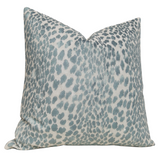 Spotted Velvet Pillow Cover in marine velvet front with ivory linen back, displayed on sofa