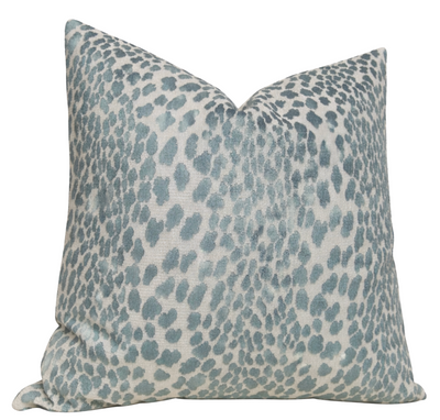Spotted Velvet Pillow Cover in marine velvet front with ivory linen back, displayed on sofa