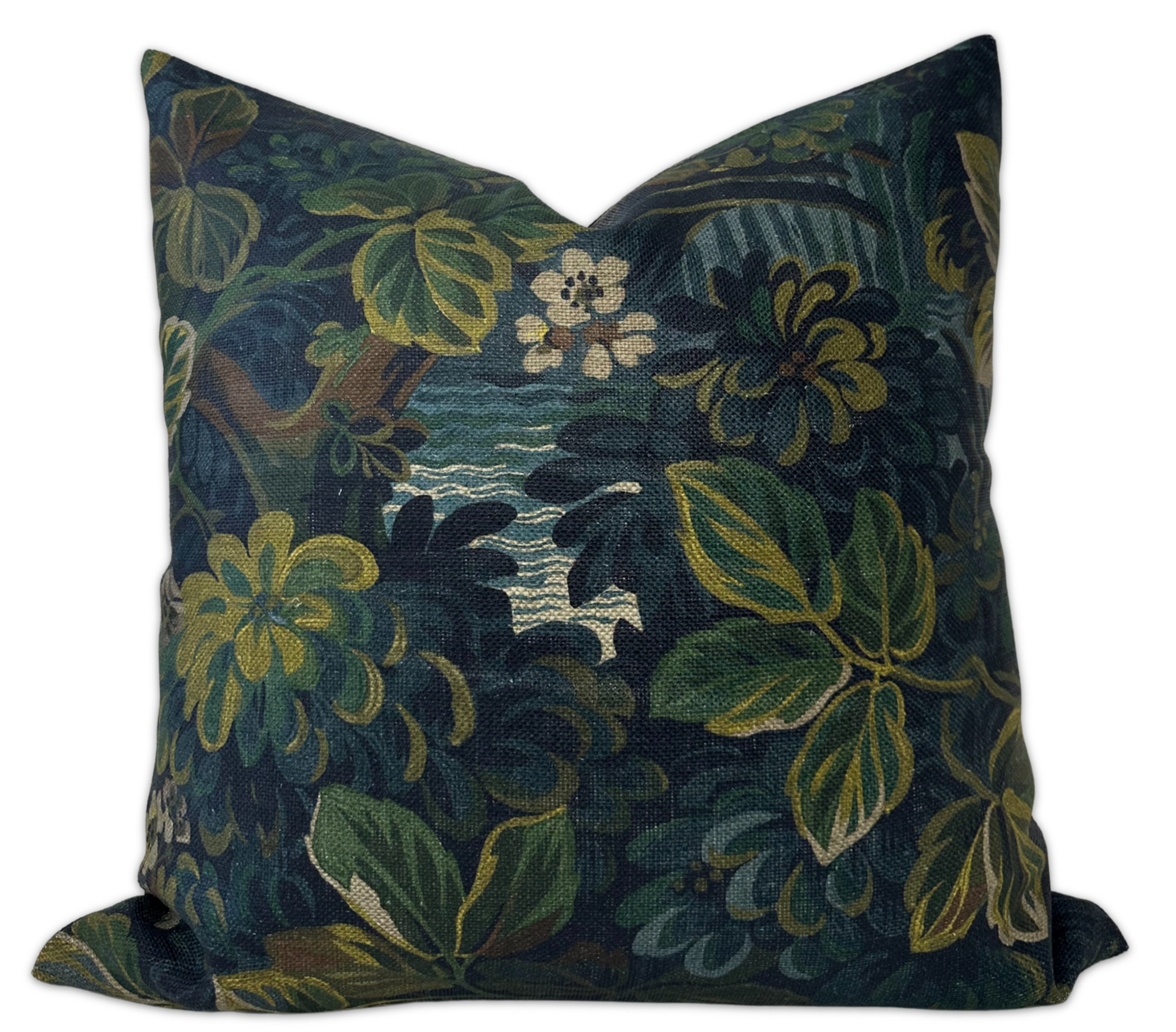 Night Garden Pillow Cover in Midnight Blue displayed on a sofa