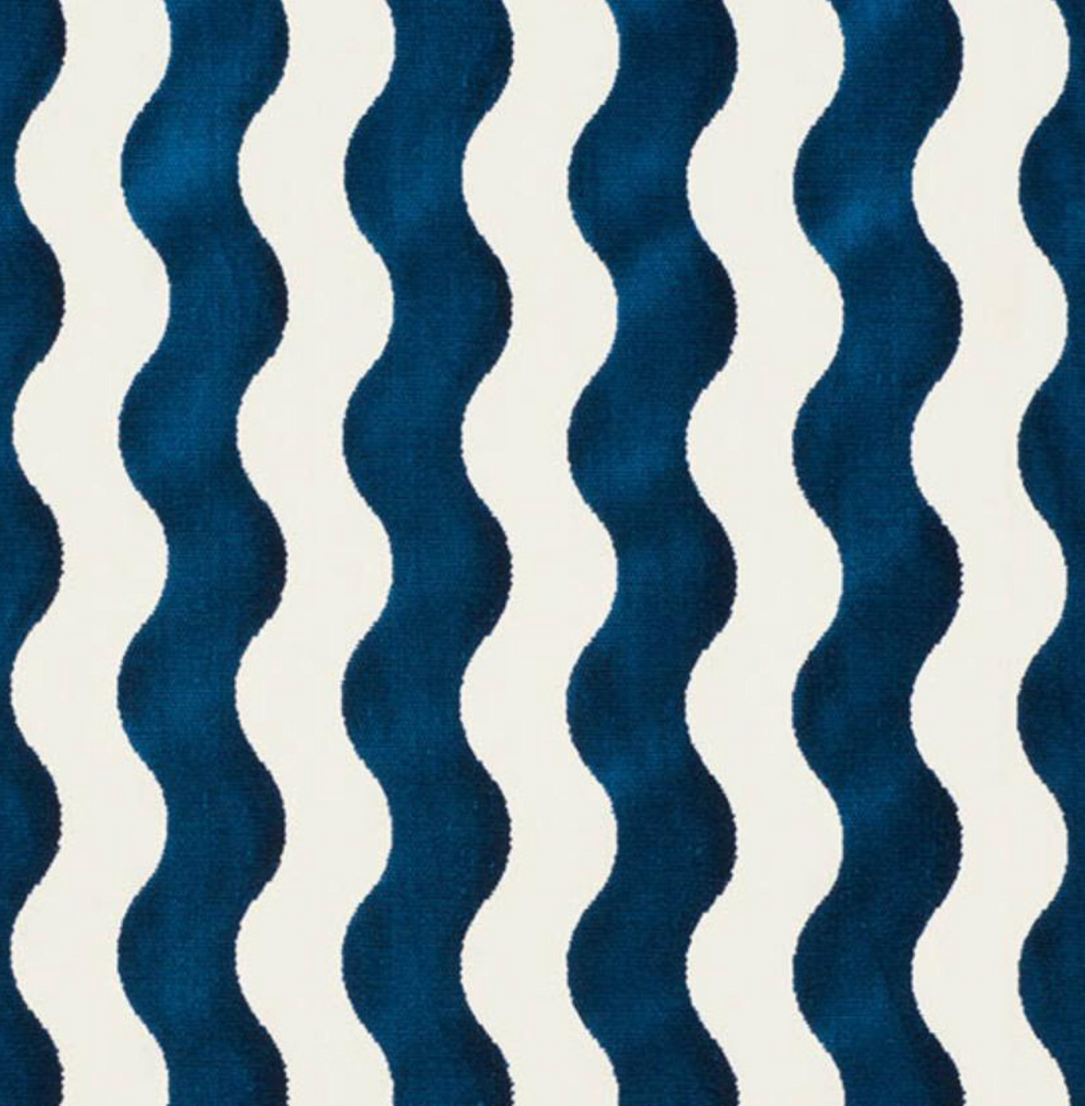 Pattern of vertical wavy stripes in alternating navy blue velvet and white on fabric, showing texture and soft sheen variations.