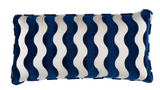 Wave Velvet Pillow Cover in navy blue with wave pattern, displayed on sofa