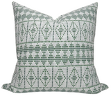 Green Souk Pillow Cover made of woven fabric by Peter Dunham displayed on sofa.
