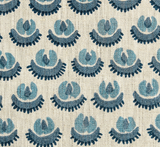 Textured woven fabric with a repeating blue floral-inspired geometric pattern on a beige background.