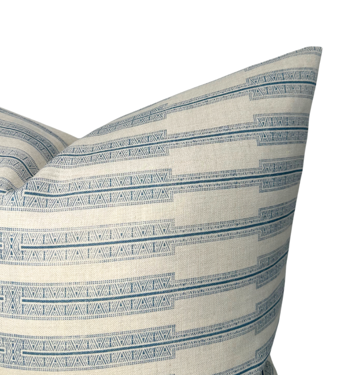 Rectangular pillow cover with horizontal blue geometric patterns on natural beige fabric, featuring repeated triangle and line motifs.