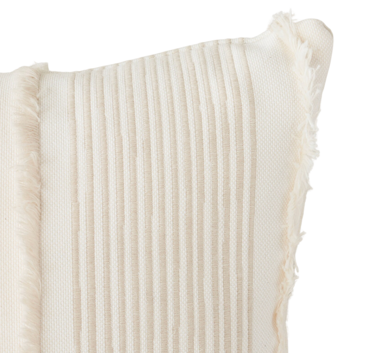 Close-up of a natural-colored pillow cover with vertical textured stripes and fringed edges, showcasing soft fabric and subtle pattern detail.