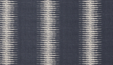 Charcoal background fabric with vertical ivory ikat stripes creating a blurred, geometric pattern with repeating diamond shapes.
