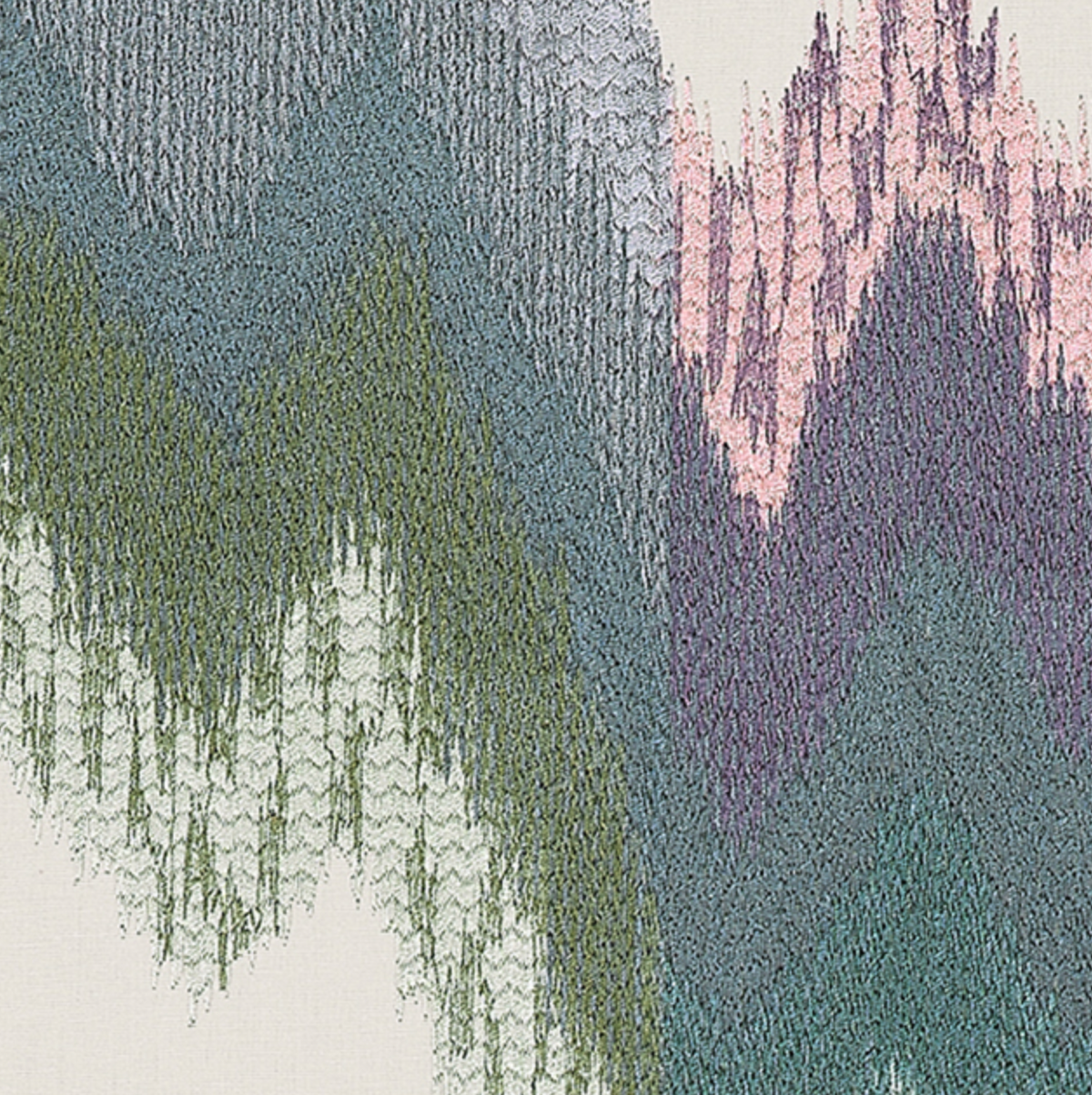 Zigzag woven pattern on fabric with alternating waves of muted green, purple, blue, and pink threads creating a textured, abstract design on a light background.