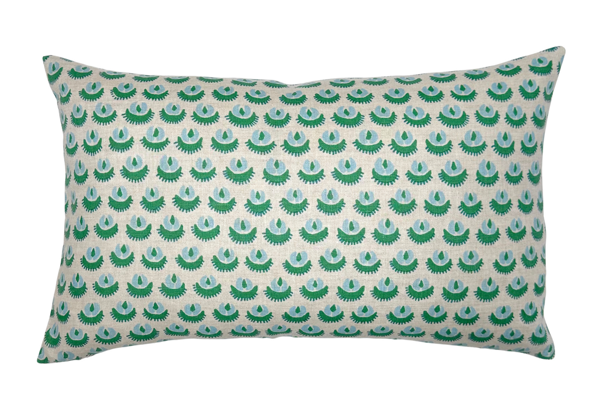 Rectangular pillow cover with repeating green, teal, and brown semi-circular fan pattern on white background, shown flat on a white surface.