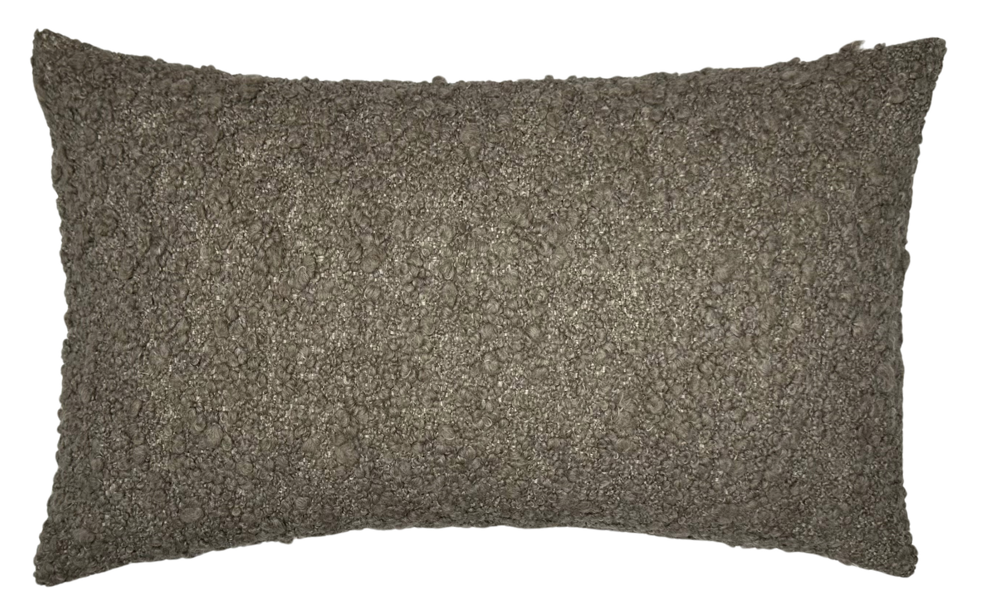 Close-up view of GILA Boucle Pillow Cover in brown showing textured fuzzy woven fabric front and ivory linen back
