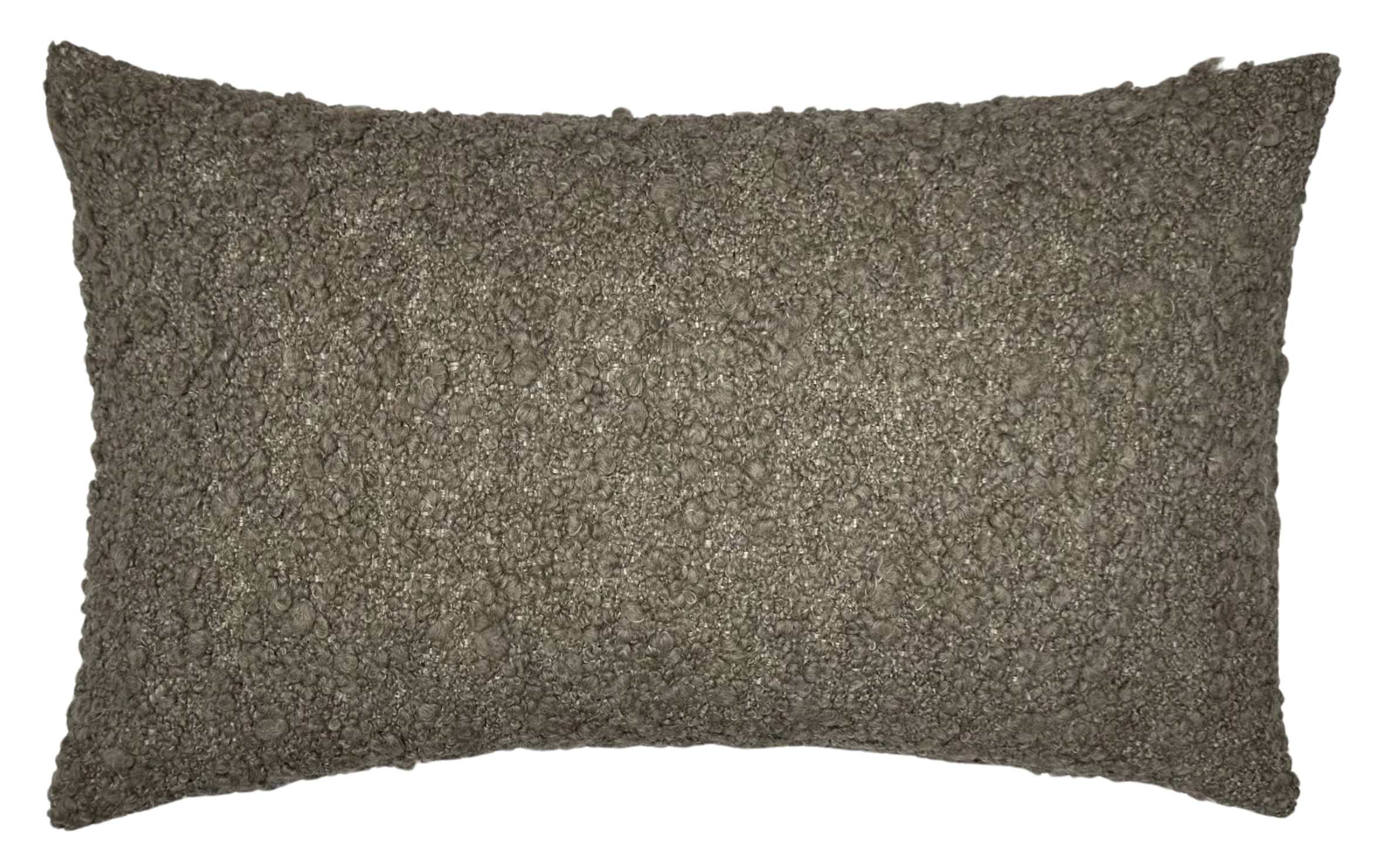 Close-up view of GILA Boucle Pillow Cover in brown showing textured fuzzy woven fabric front and ivory linen back