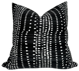 Cape Town Pillow Cover in Black shown on sofa with contrasting pillow backs