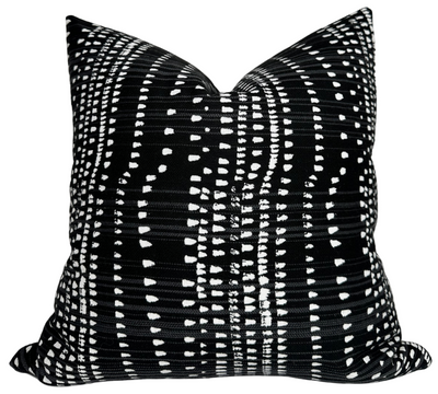 Cape Town Pillow Cover in Black shown on sofa with contrasting pillow backs