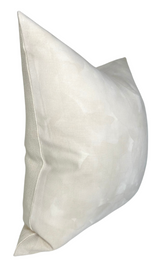 Pearl-colored Casablanca pillow cover with subtle mottled texture and a clean seam along the edge, shown angled slightly from the side.