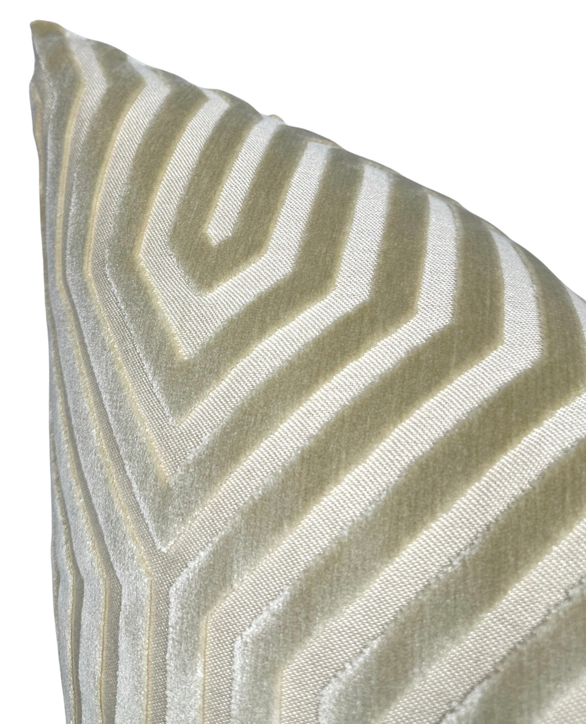 Close-up of a Vanderbilt pillow cover in greige featuring a geometric pattern of raised velvet lines on a smooth fabric background.