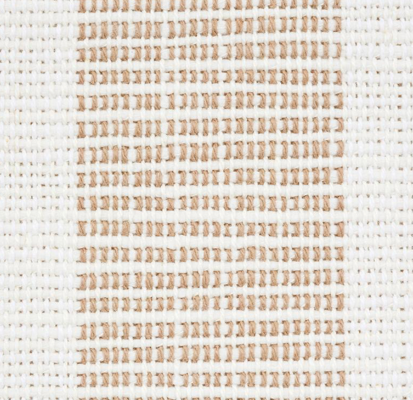 Close-up of woven textile with a natural beige striped pattern on a white background, showing a grid-like texture.