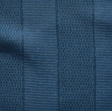 Close-up of midnight blue fabric with alternating textured vertical stripes featuring subtle woven patterns and slightly raised weave details.