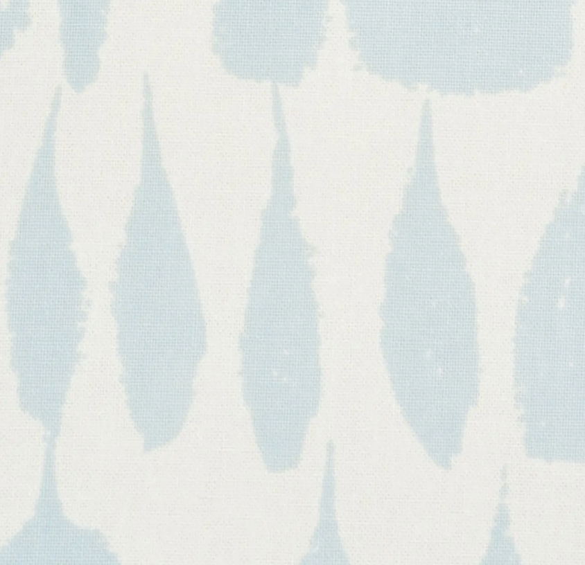 Soft sky blue leaf-like shapes arranged vertically on a white textile background with a subtle woven texture.