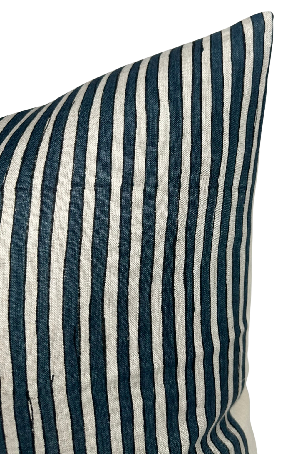 Close-up of a pillow cover featuring narrow vertical stripes in Indian teal and natural beige colors with a slightly textured fabric surface.