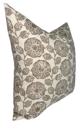 Square pillow cover with sepia-toned floral pattern featuring round flowers and leaves on light fabric, shown at an angled side view.