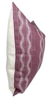 Rectangular pillow with off-white sides and a front panel of muted mauve displaying three vertical wavy white lines with crackled texture pattern.