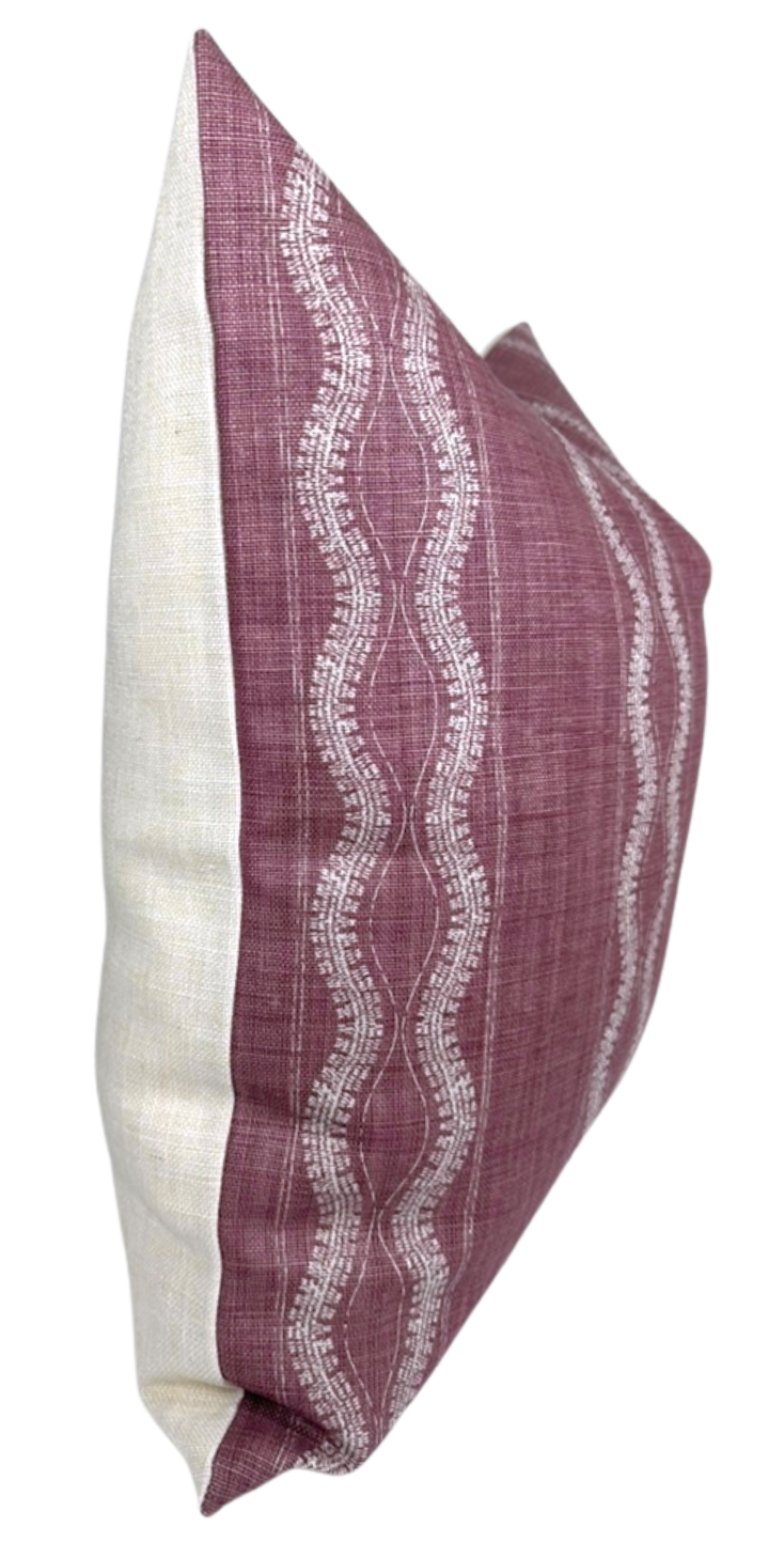 Rectangular pillow with off-white sides and a front panel of muted mauve displaying three vertical wavy white lines with crackled texture pattern.