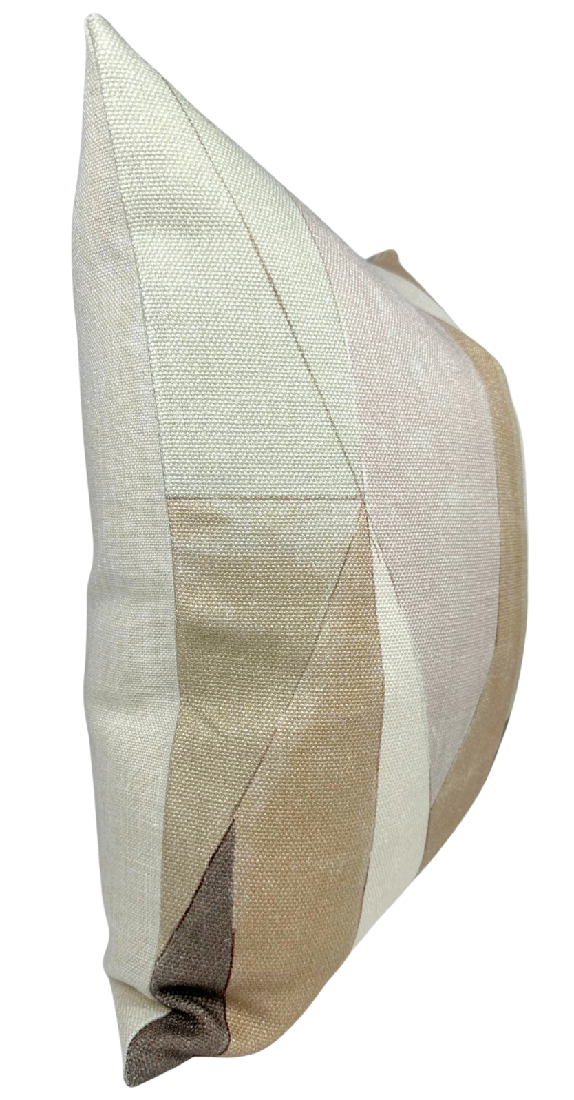 Side view of a geometric-patterned pillow cover with muted shades of beige, cream, and pale brown arranged in angular sections creating a subtle patchwork effect.