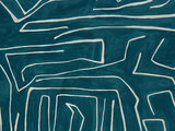 Teal fabric with an abstract white line pattern forming irregular geometric shapes, creating a modern and textured appearance.