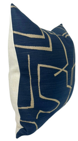 Rectangular pillow cover with deep indigo front featuring beige abstract linear patterns and a plain off-white fabric on the sides and back.