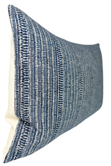 Rectangular pillow cover with textured woven pattern in shades of Pacific blue and white, showcasing vertical and horizontal lines and small dot motifs.