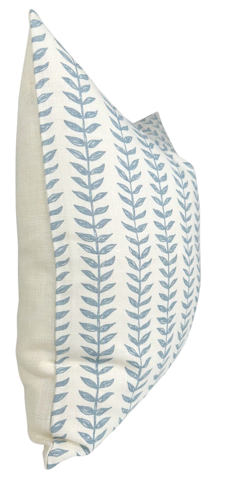 Square pillow cover with vertical blue willow leaf pattern on white front and natural beige linen back, shown at an angle highlighting fabric texture.