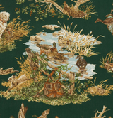 Illustration on dark green fabric showing ducks swimming in a pond amid cattails, with a white hunting dog and rustic basket nearby.
