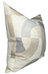Square pillow cover with abstract geometric shapes in soft parchment, taupe, and gray tones on a light background, showing subtle curves and blocks.