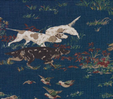 Navy blue textile featuring three hunting dogs in white, brown, and black poised among scattered grass and small birds in motion.