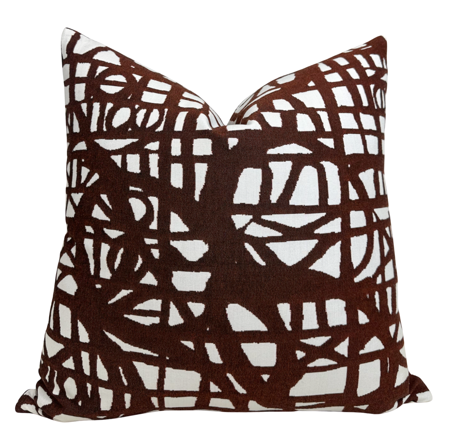Ecriture Pillow Cover in Rust shown on seating with textured woven fabric and coordinating ivory back