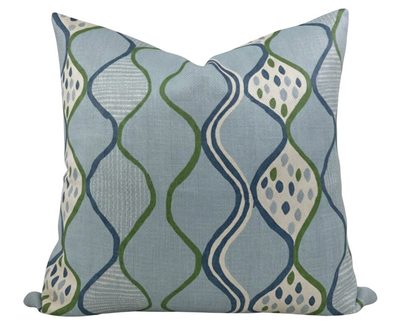 Blue Baltic Weave Pillow Cover by Peter Dunham Textiles, shown on sofa with blue and neutral tones